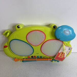 B. Toys Ribbit Tat Tat Interactive Music Lights Frog Drum